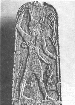 Baal of the lightning, stele from Râs Shamrah. The small human figure may be a deity or a person in the god’s care. (Louvre)