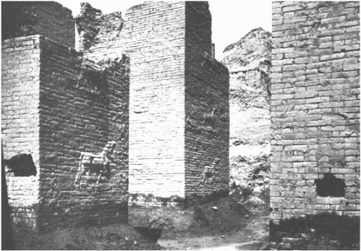 Western towers of the Ishtar gate, with reliefs of animals. Constructed by Nebuchadrezzar II (605–562 b.c.), the gate led to the sacred processional street. (Oriental Institute, University of Chicago) See Plate 6.